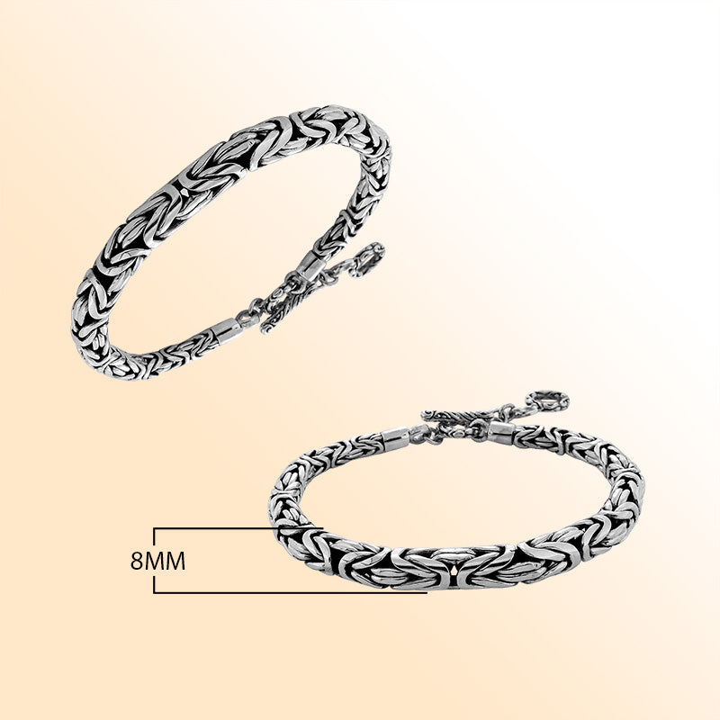 Retail sterling silver bracelet with an 8MM round braided chain featuring polished surfaces, oxidized contrast, and a toggle lock for bold everyday luxury styling.