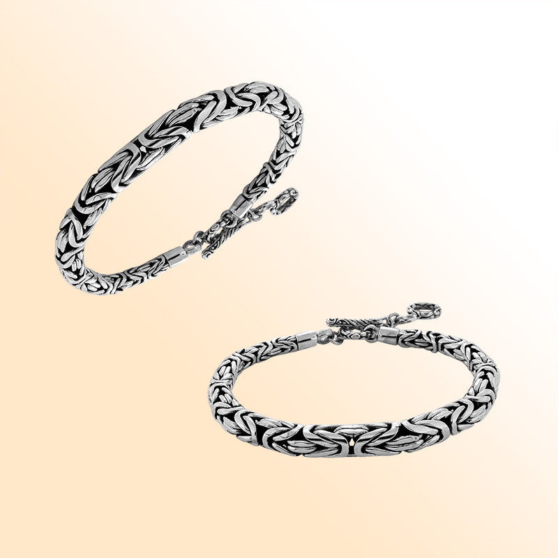 Retail sterling silver bracelet with an 8MM round braided chain featuring polished surfaces, oxidized contrast, and a toggle lock for bold everyday luxury styling.
