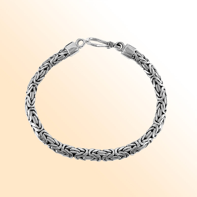 Retail sterling silver bracelet with a refined 3MM x 5MM Balinese woven chain featuring polished surfaces, oxidized accents, and a secure lobster lock for daily wear.