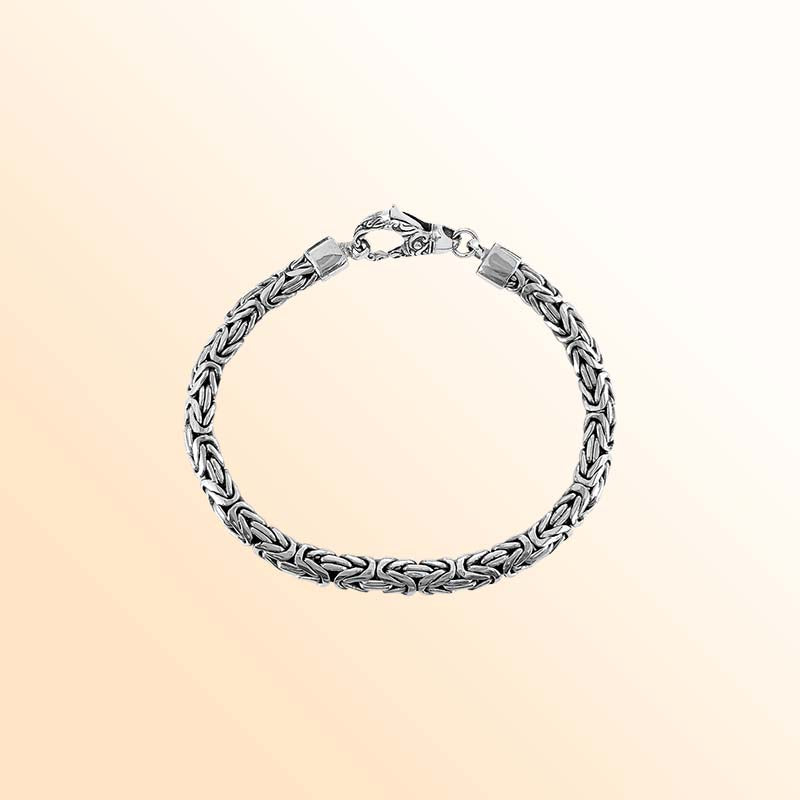 Retail sterling silver bracelet with a refined 3MM x 5MM Balinese woven chain featuring polished surfaces, oxidized accents, and a secure lobster lock for daily wear.
