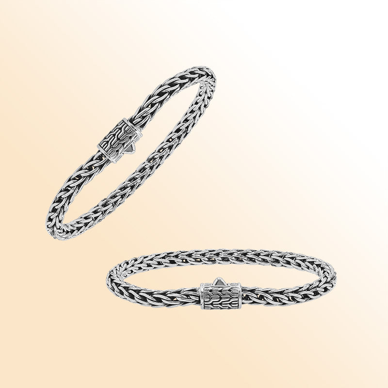 Retail sterling silver bracelet featuring a luxurious 5MM woven Balinese chain with polished detailing and a secure push clasp for elegant daily wear.