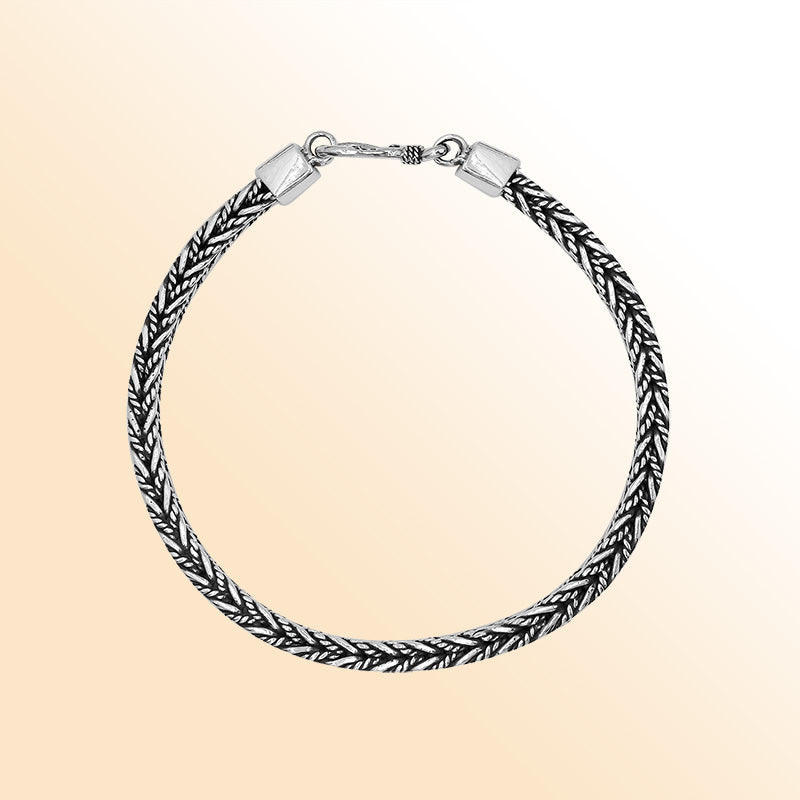 Handcrafted sterling silver wheat chain bracelet with oxidized finish and hook clasp from Bali.