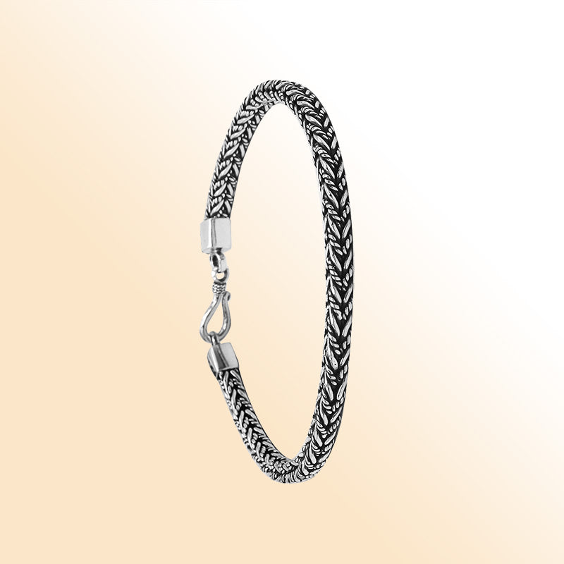 Handcrafted sterling silver wheat chain bracelet with oxidized finish and hook clasp from Bali.Handcrafted sterling silver wheat chain bracelet with oxidized finish and hook clasp from Bali.