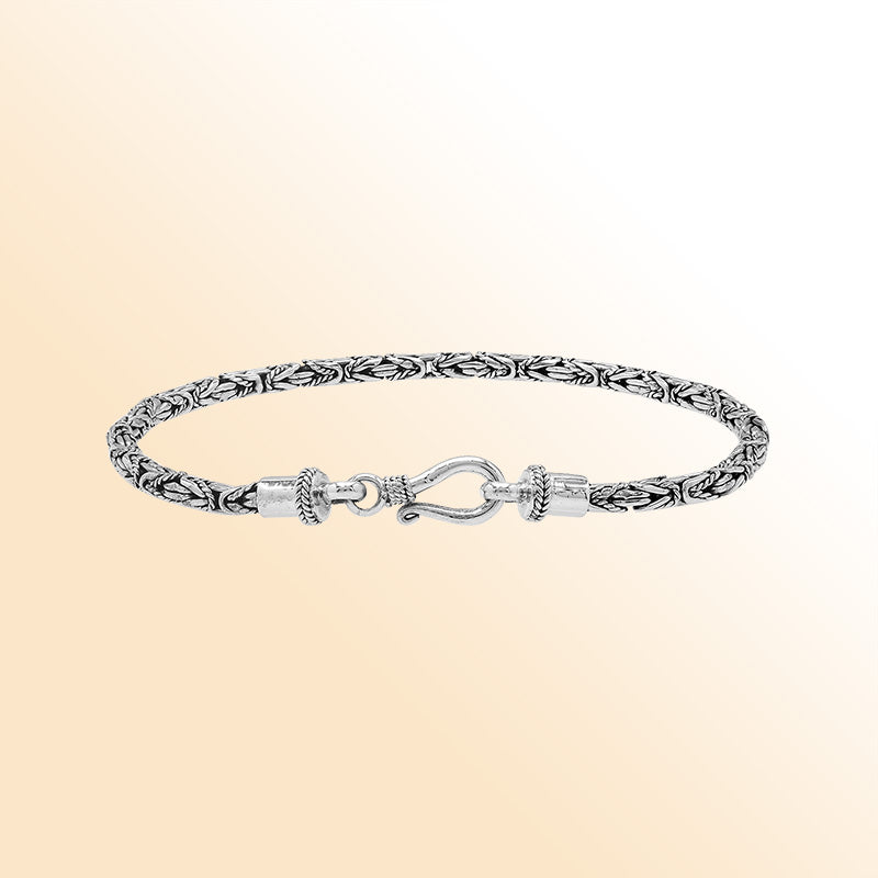 Sterling silver Balinese bracelet with woven wheat-link chain and handcrafted lobster clasp.