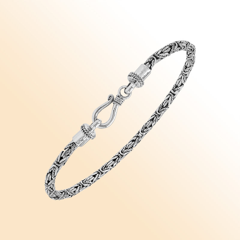 Sterling silver Balinese bracelet with woven wheat-link chain and handcrafted lobster clasp.