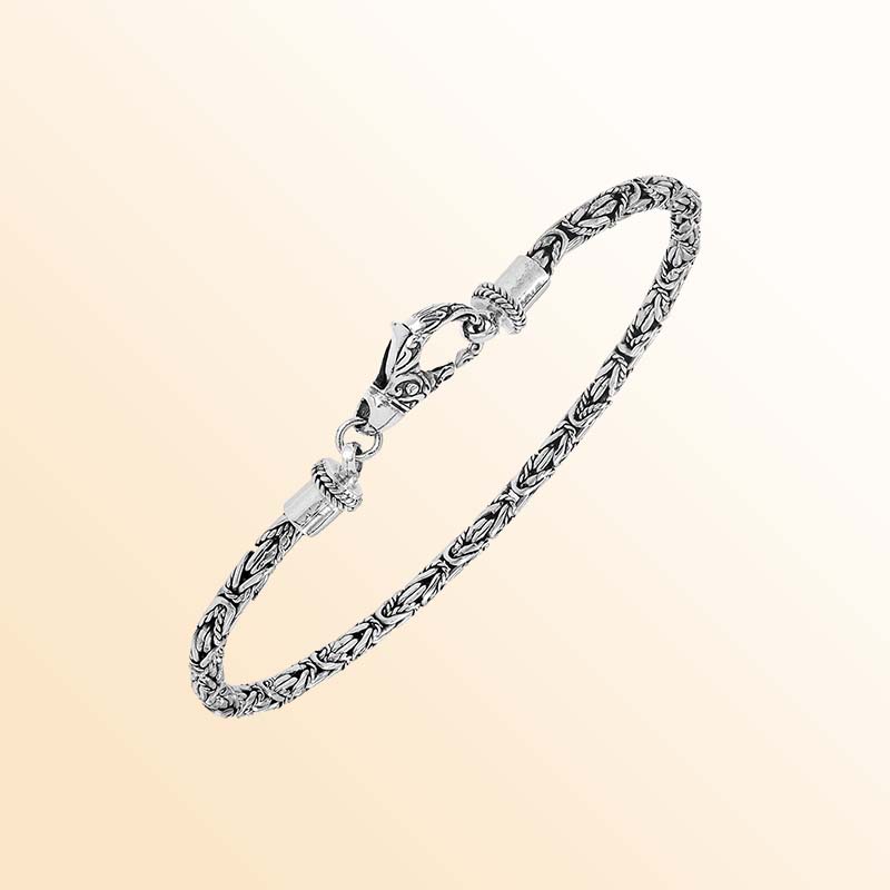 Sterling silver Balinese bracelet with woven wheat-link chain and handcrafted lobster clasp.