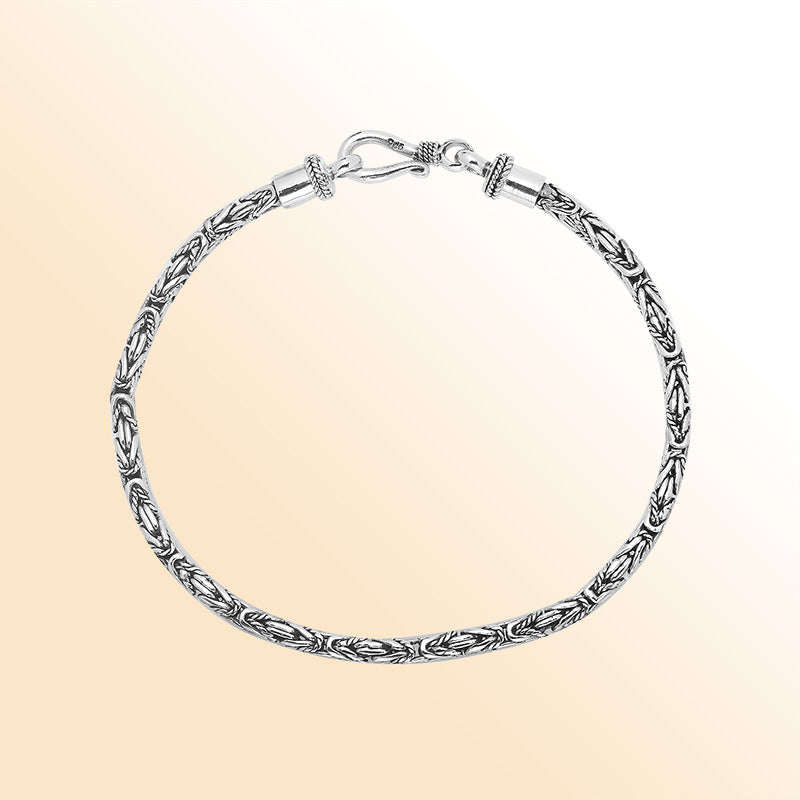 Sterling silver Balinese bracelet with woven wheat-link chain and handcrafted lobster clasp.