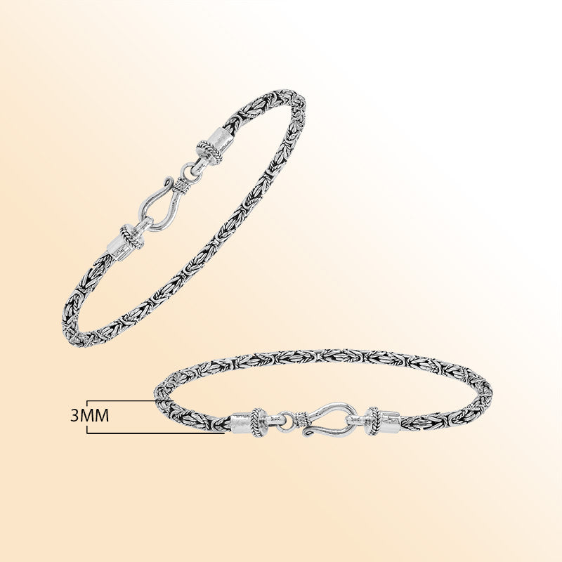 Sterling silver Balinese bracelet with woven wheat-link chain and handcrafted lobster clasp.