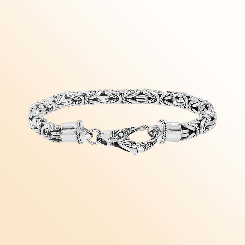 Sterling silver bracelet with Balinese woven wheat-link chain and handcrafted lobster clasp made in Bali.
