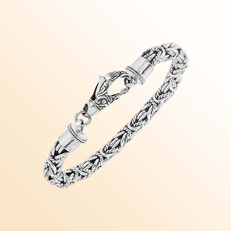 Sterling silver bracelet with Balinese woven wheat-link chain and handcrafted lobster clasp made in Bali.
