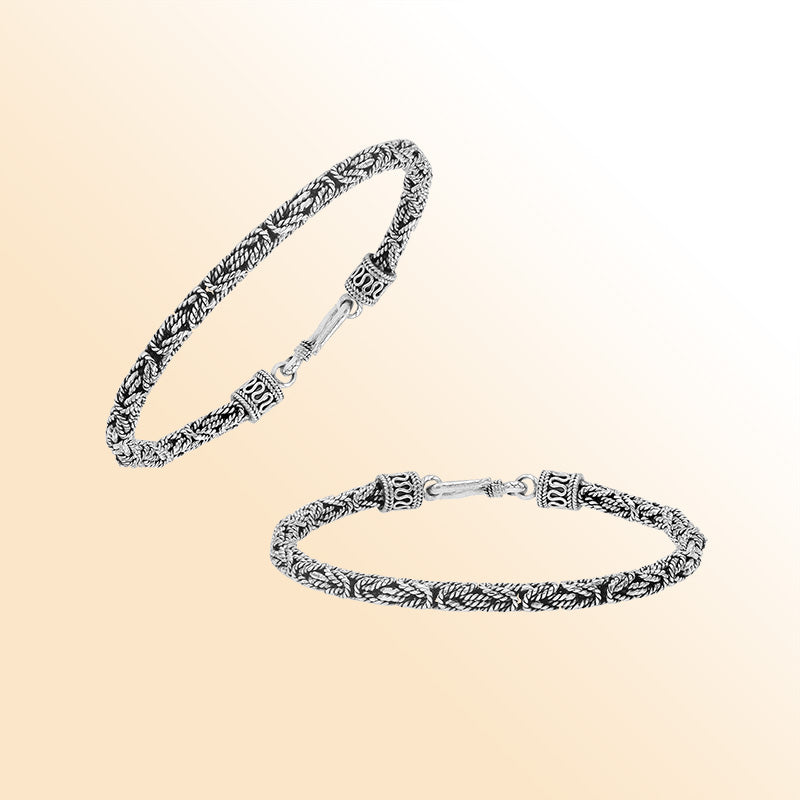 Handcrafted sterling silver Balinese bracelet with oxidized finish and detailed hook clasp.
