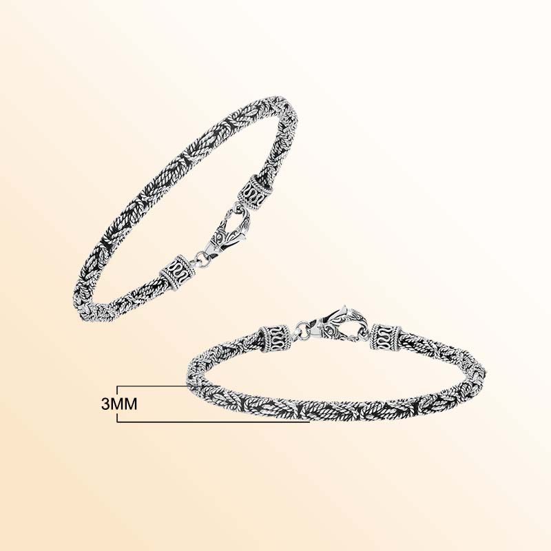 Handcrafted sterling silver Balinese bracelet with oxidized finish and detailed hook clasp.