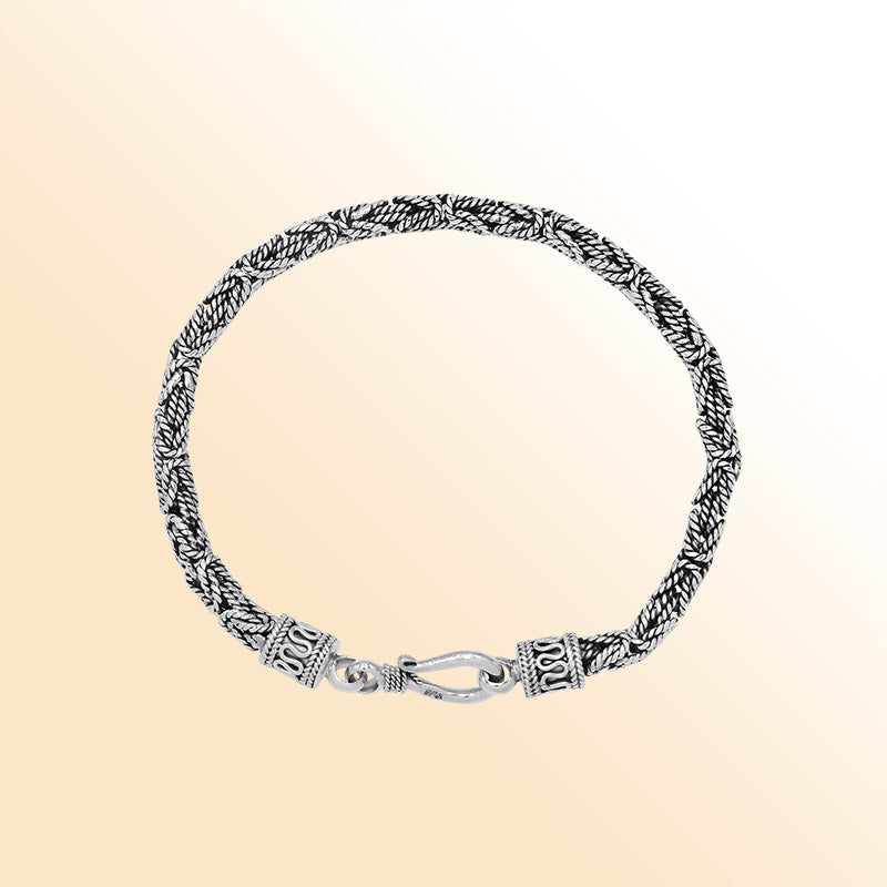 Handcrafted sterling silver Balinese bracelet with oxidized finish and detailed hook clasp.