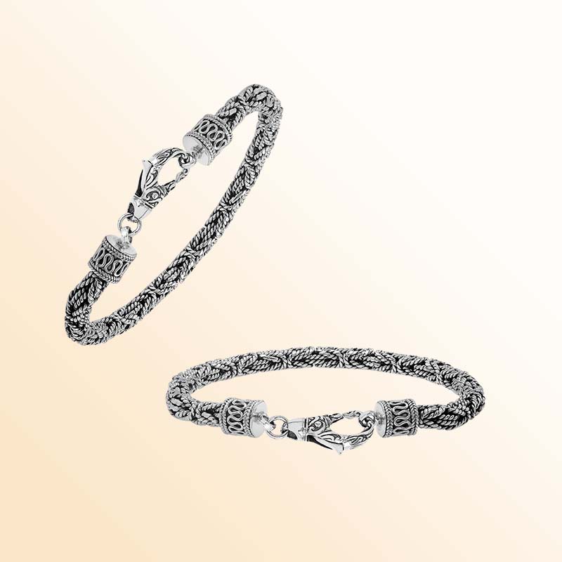 Retail sterling silver bracelet featuring a polished and oxidized 4MM woven Balinese chain with a secure lobster lock for refined daily wear.