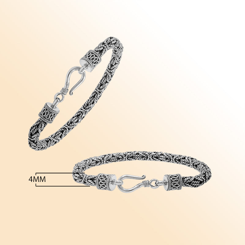 Retail sterling silver bracelet featuring a polished and oxidized 4MM woven Balinese chain with a secure lobster lock for refined daily wear.