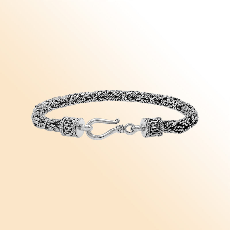 Retail sterling silver bracelet with a polished and oxidized 5MM woven Balinese chain and secure lobster lock for timeless everyday styling.