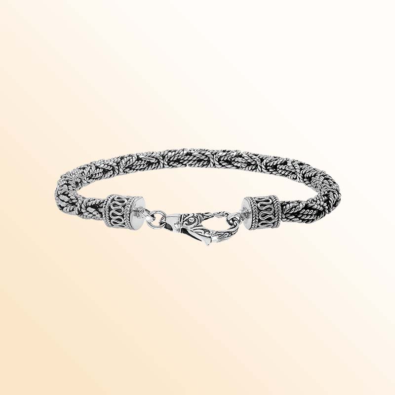 Retail sterling silver bracelet with a polished and oxidized 5MM woven Balinese chain and secure lobster lock for timeless everyday styling.