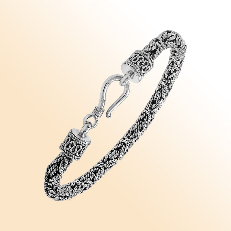 Retail sterling silver bracelet with a polished and oxidized 5MM woven Balinese chain and secure lobster lock for timeless everyday styling.