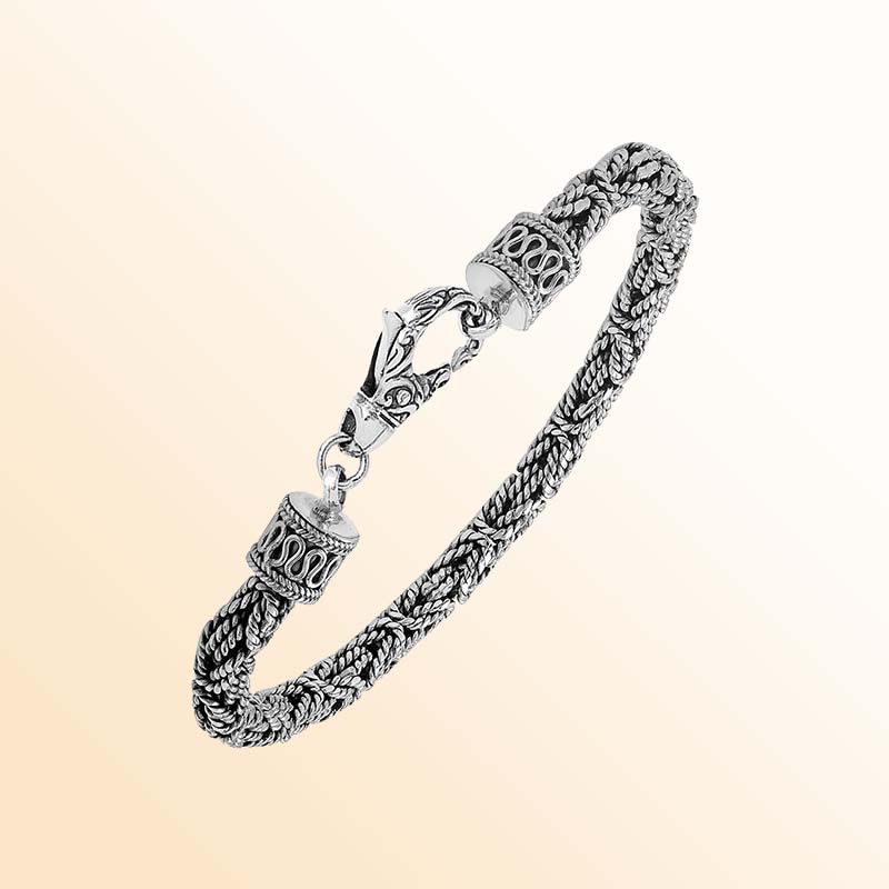 Retail sterling silver bracelet with a polished and oxidized 5MM woven Balinese chain and secure lobster lock for timeless everyday styling.