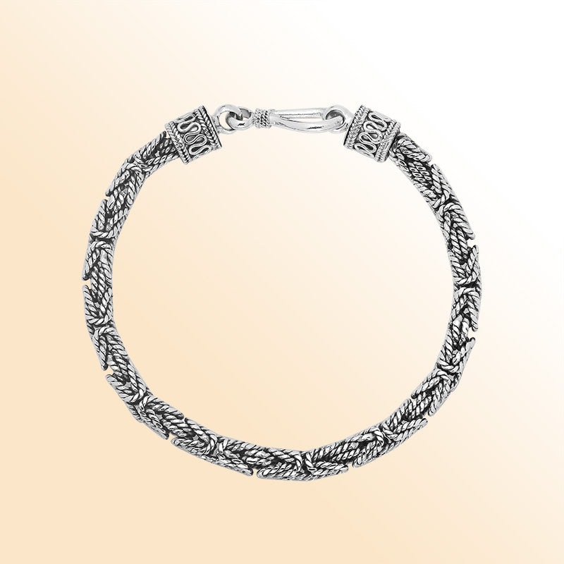 Retail sterling silver bracelet with a polished and oxidized 5MM woven Balinese chain and secure lobster lock for timeless everyday styling.