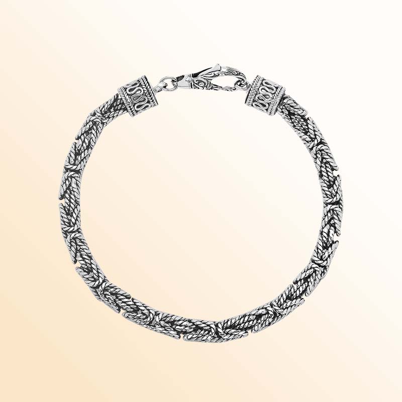 Retail sterling silver bracelet with a polished and oxidized 5MM woven Balinese chain and secure lobster lock for timeless everyday styling.