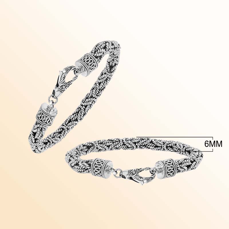 Retail sterling silver bracelet showcasing an elegant 6MM woven Balinese chain design with oxidized accents and a strong lobster lock for everyday luxury wear.
