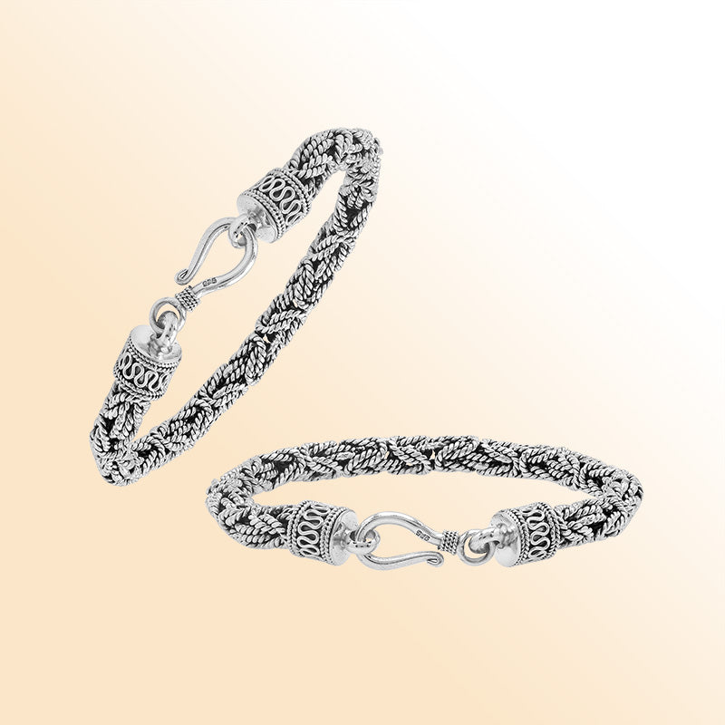 Retail sterling silver bracelet showcasing an elegant 6MM woven Balinese chain design with oxidized accents and a strong lobster lock for everyday luxury wear.
