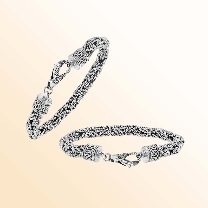 Retail sterling silver bracelet showcasing an elegant 6MM woven Balinese chain design with oxidized accents and a strong lobster lock for everyday luxury wear.
