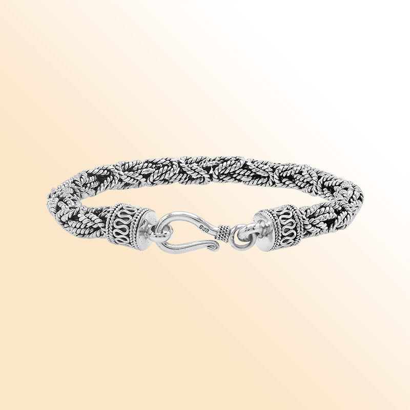 Retail sterling silver bracelet showcasing an elegant 6MM woven Balinese chain design with oxidized accents and a strong lobster lock for everyday luxury wear.