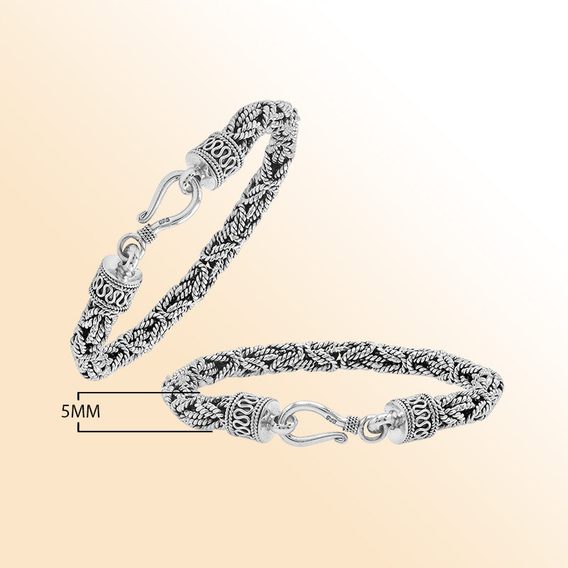 Retail sterling silver bracelet showcasing an elegant 6MM woven Balinese chain design with oxidized accents and a strong lobster lock for everyday luxury wear.