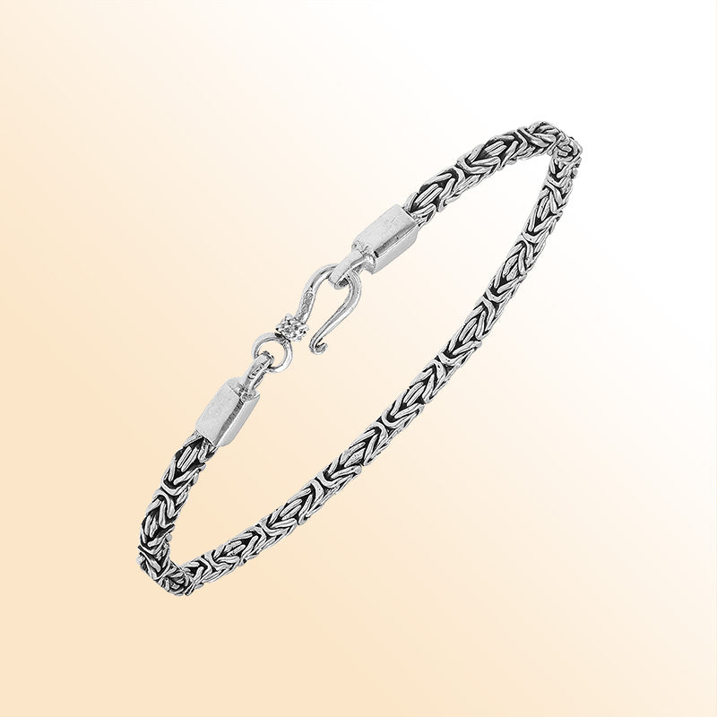 Sterling silver Balinese bracelet featuring woven chain design and handcrafted lobster clasp made in Bali.