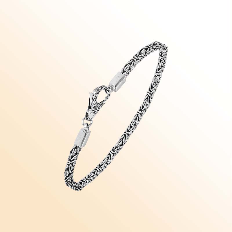 Sterling silver Balinese bracelet featuring woven chain design and handcrafted lobster clasp made in Bali.