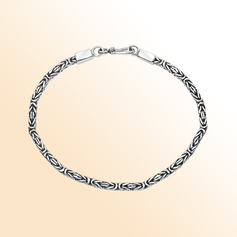 Sterling silver Balinese bracelet featuring woven chain design and handcrafted lobster clasp made in Bali.