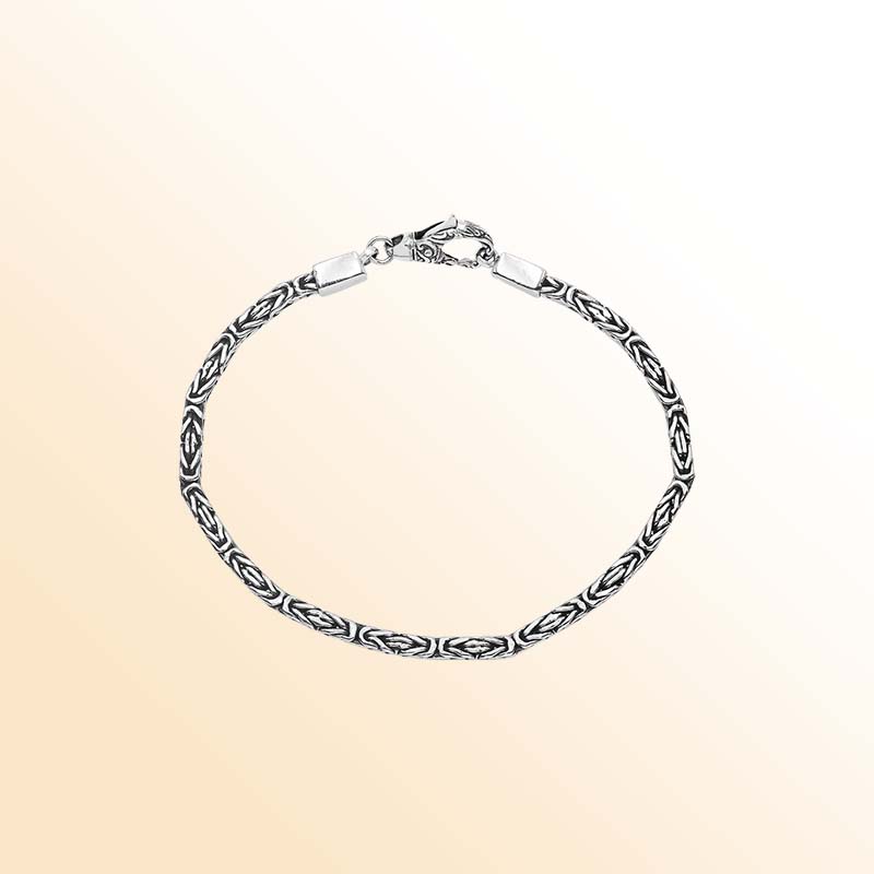 Sterling silver Balinese bracelet featuring woven chain design and handcrafted lobster clasp made in Bali.