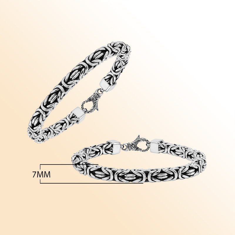 Retail sterling silver bracelet showcasing a detailed 7MM Balinese woven chain with polished and oxidized elements paired with a secure lobster lock.