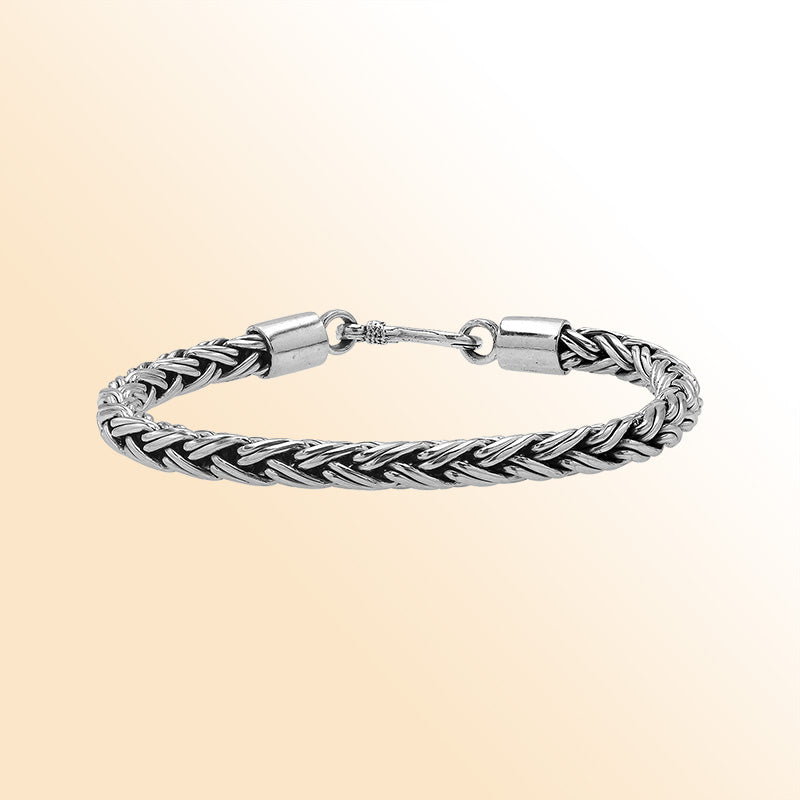 Handcrafted sterling silver Balinese wheat chain bracelet with oxidized finish and hook clasp.