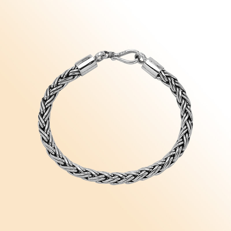 Handcrafted sterling silver Balinese wheat chain bracelet with hook clasp and oxidized detailing.
