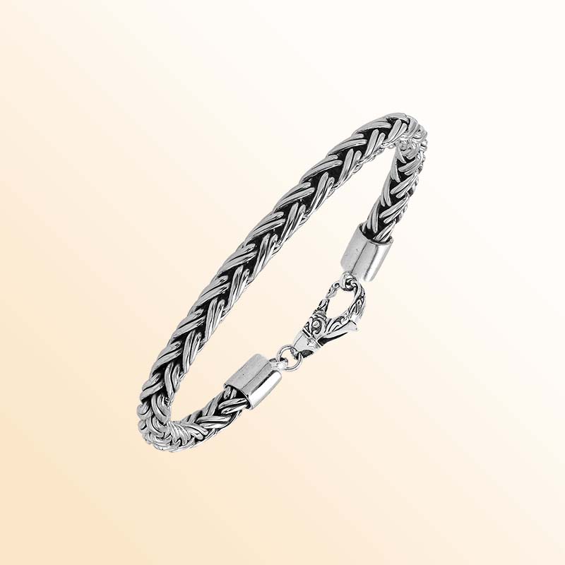 Handcrafted sterling silver Balinese wheat chain bracelet with hook clasp and oxidized detailing.