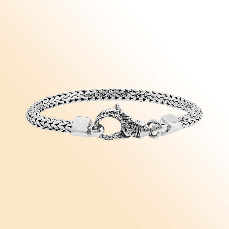 Retail sterling silver bracelet featuring a detailed 5MM Balinese woven chain with polished and oxidized finish secured with a sturdy lobster clasp for daily wear.