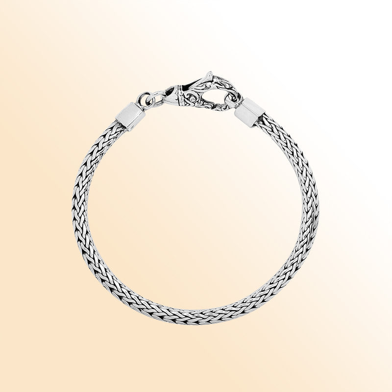 Retail sterling silver bracelet featuring a bold 6MM Balinese woven chain with polished and oxidized finish secured with a durable lobster clasp.
