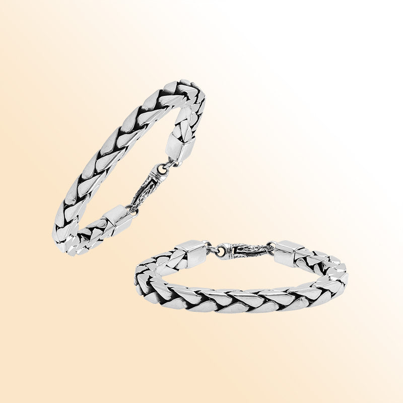 Retail sterling silver bracelet showcasing a polished 6MM flat-weave chain with oxidized highlights and a secure lobster lock for stylish everyday wear.