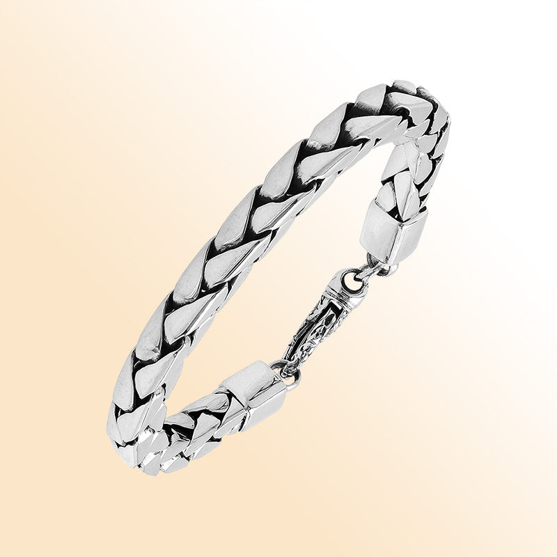 Retail sterling silver bracelet showcasing a polished 6MM flat-weave chain with oxidized highlights and a secure lobster lock for stylish everyday wear.
