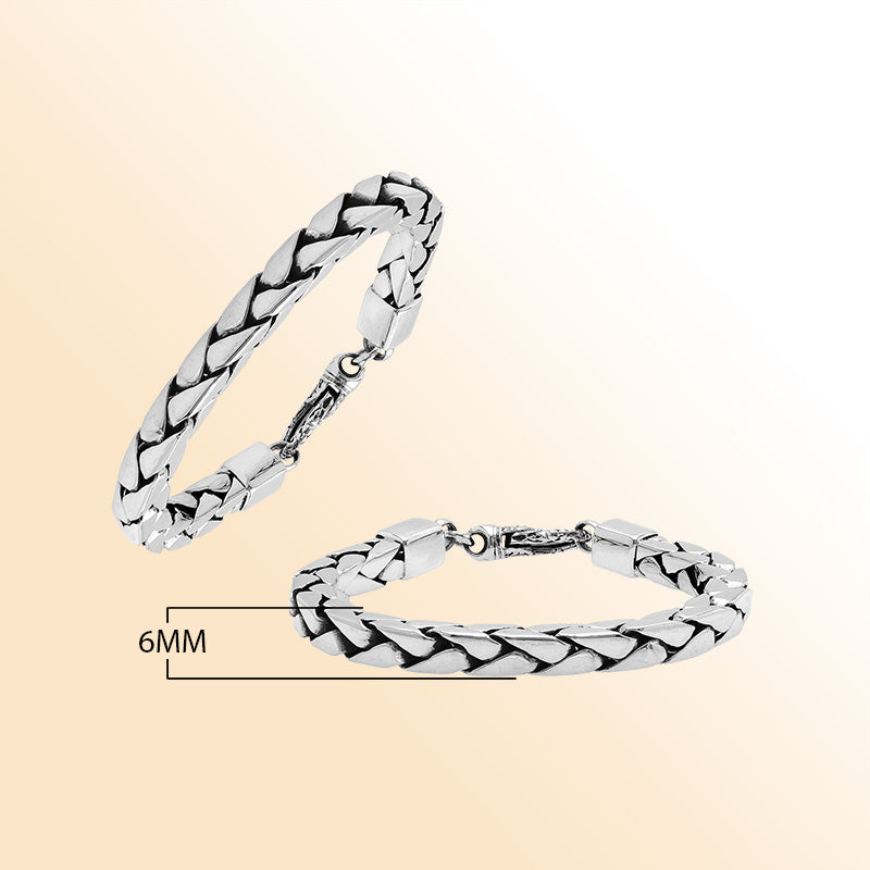 Retail sterling silver bracelet showcasing a polished 6MM flat-weave chain with oxidized highlights and a secure lobster lock for stylish everyday wear.