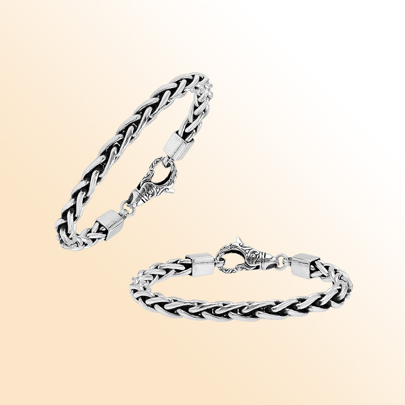 Sterling silver bracelet featuring a handcrafted Balinese braided chain and ornate lobster clasp.