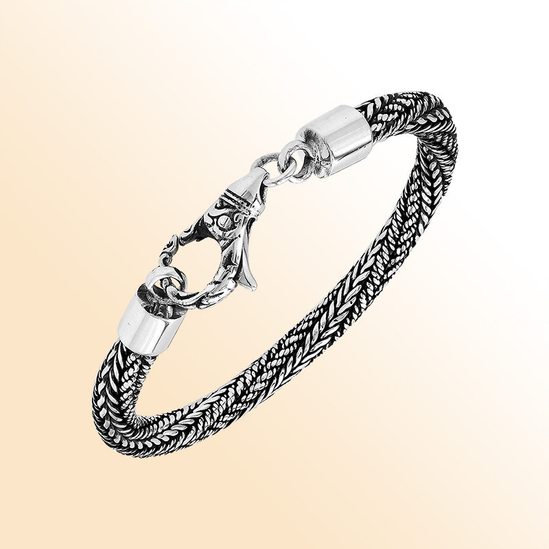 Retail sterling silver bracelet with a 5MM handwoven chain featuring oxidized detailing and a decorative lobster lock designed for elegant everyday styling.