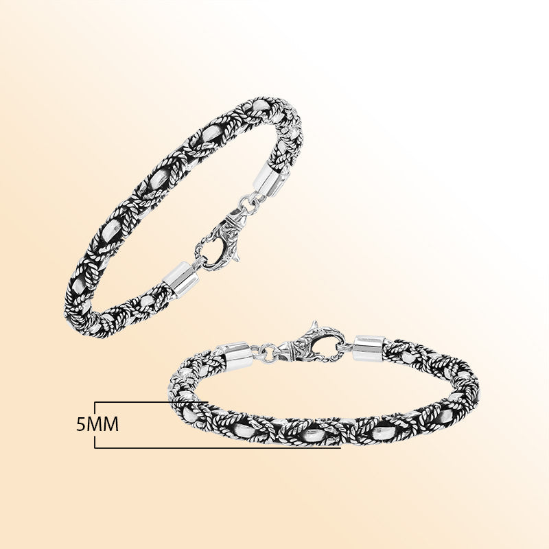 Retail sterling silver bracelet featuring a 5MM braided-pattern chain with oxidized detailing and a decorative lobster lock designed for fashionable and secure everyday wear.