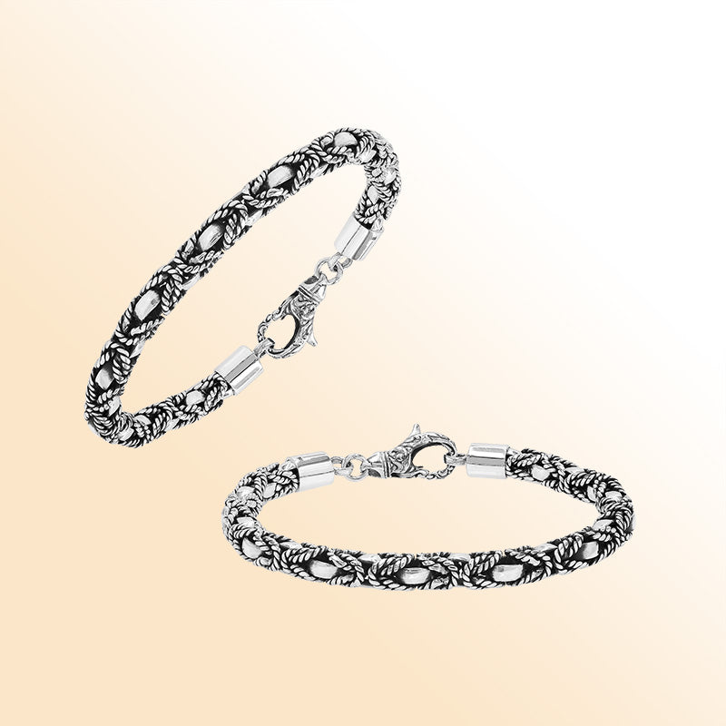 Retail sterling silver bracelet featuring a 5MM braided-pattern chain with oxidized detailing and a decorative lobster lock designed for fashionable and secure everyday wear.