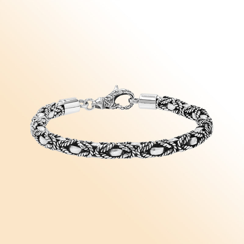 Retail sterling silver bracelet featuring a 5MM braided-pattern chain with oxidized detailing and a decorative lobster lock designed for fashionable and secure everyday wear.