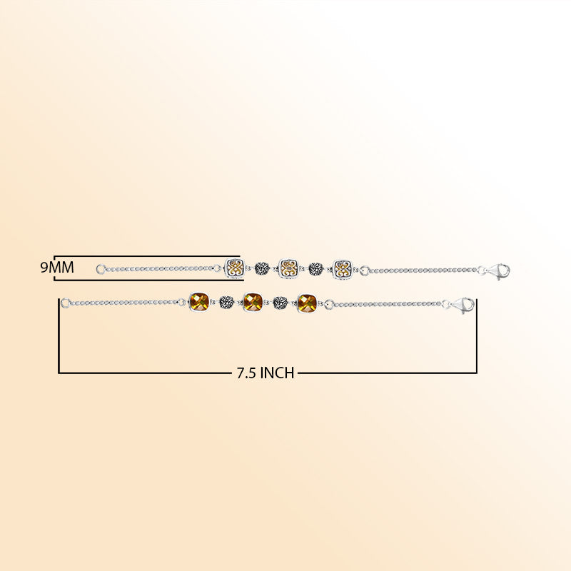 Sterling silver bracelet with citrine quartz cushion stones and handcrafted Bali filigree accents.