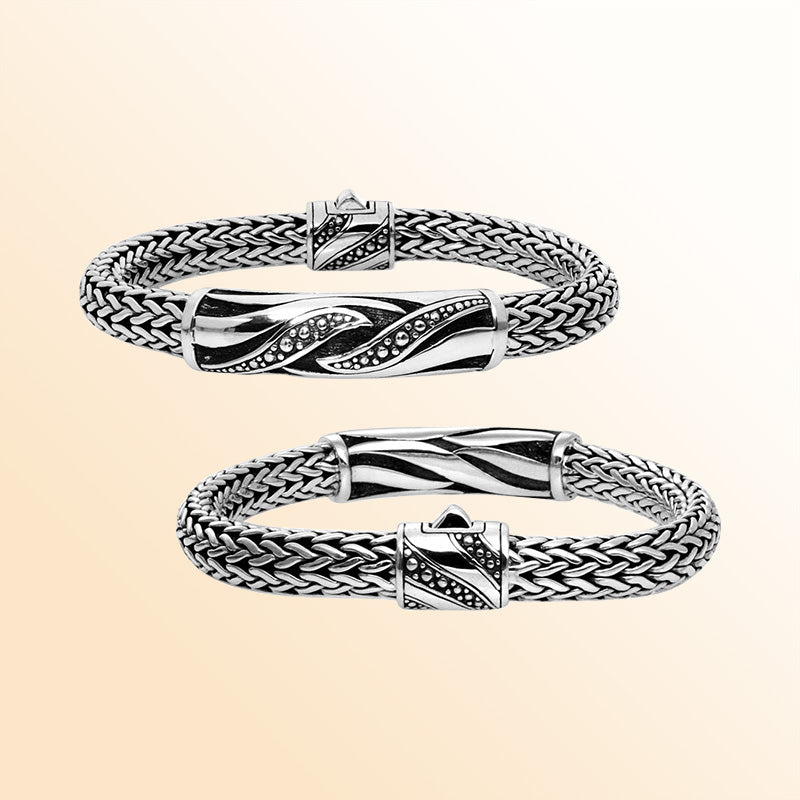 Sterling silver Bali woven bracelet showcasing an engraved centerpiece and artistic push clasp, designed for women seeking bold, expressive, and elegant everyday jewelry.